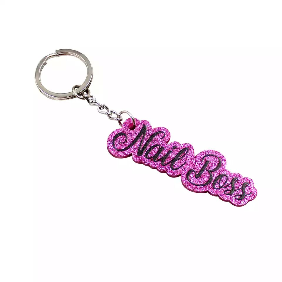 NailMePeriod’s “Acrylic Nail Boss Keychain.”